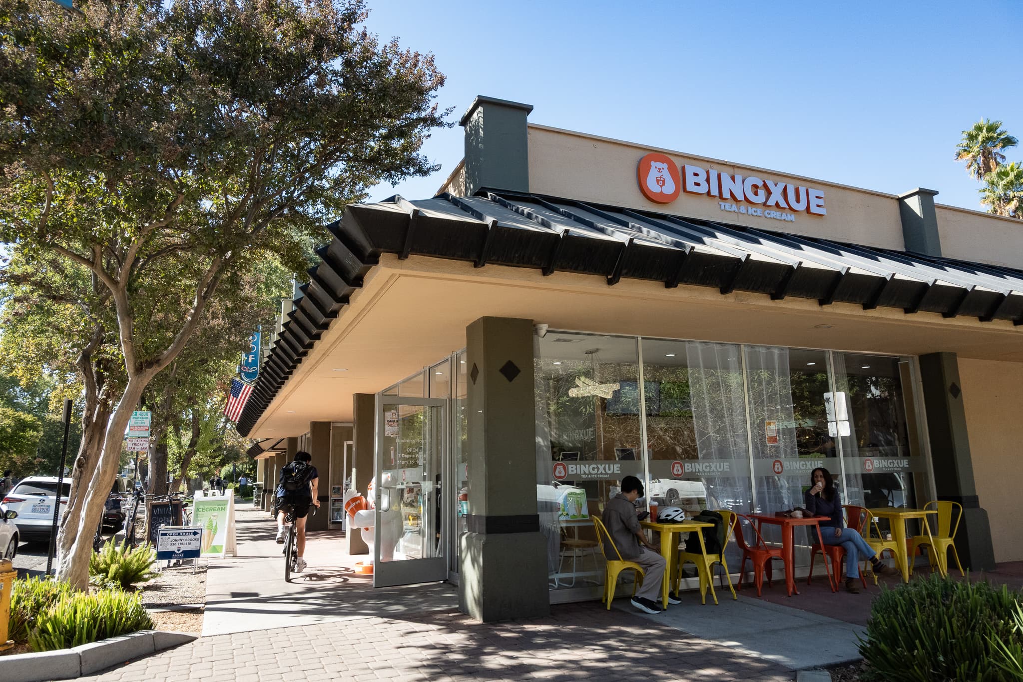 Customers sit outside the newly opened BingXue on Oct. 15, 2026. BingXue, an ice cream and tea store which opened on Oct. 2, 2026, is the first store to open in the U.S. (Julia Heron-Watts / Aggie)